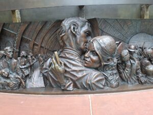 Plaque from statue at St Pancras